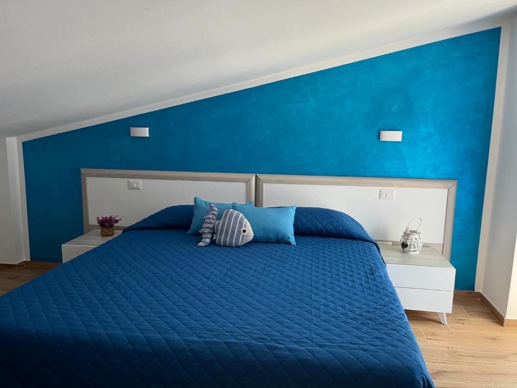 Postel nebo postele na pokoji v ubytování B&b Niu Susu