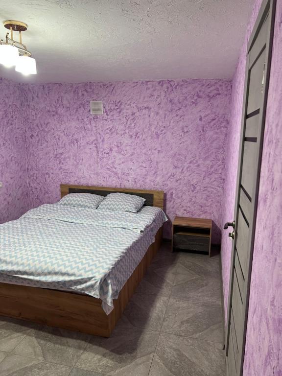 Postel nebo postele na pokoji v ubytování 21 Street guest house