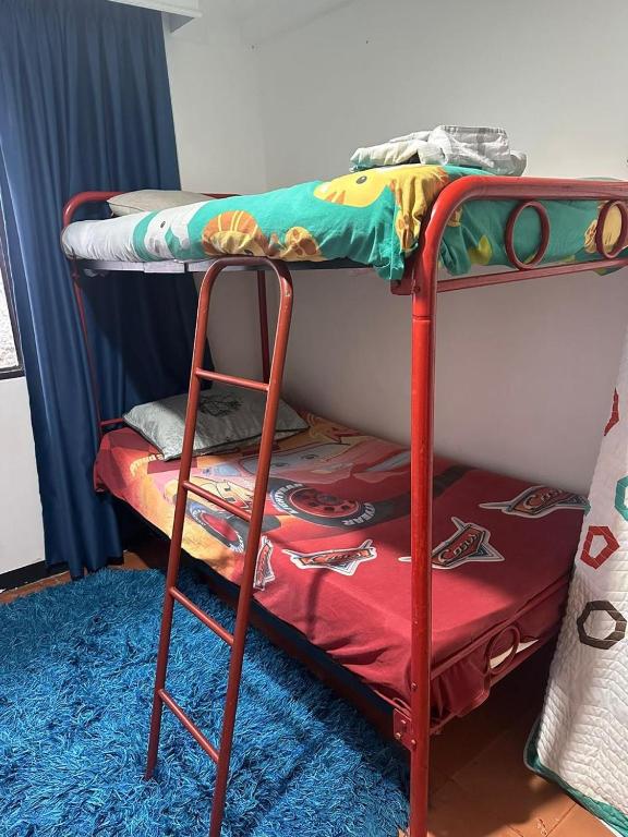 Postel nebo postele na pokoji v ubytování La Casona Hostal