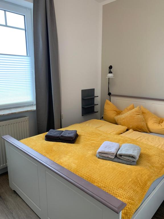 Postel nebo postele na pokoji v ubytování Huus Mövchen