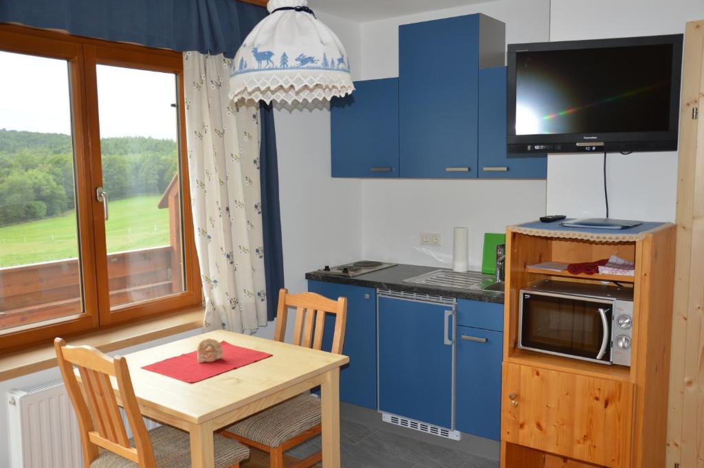 Kuchyň nebo kuchyňský kout v ubytování Biobauernhof Wolf-Hof