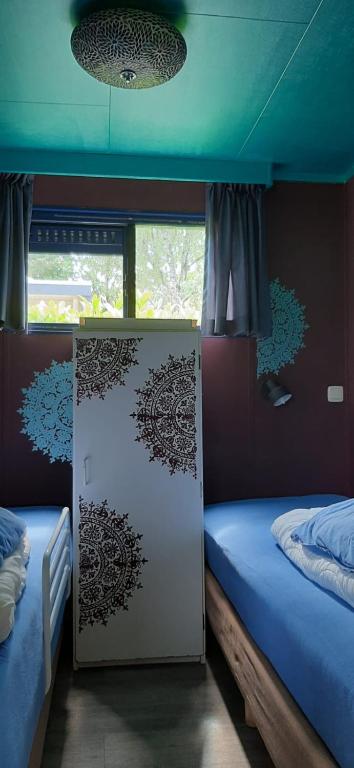 Postel nebo postele na pokoji v ubytování Chalet Veluwe G10 Veldkamp 4 Personen