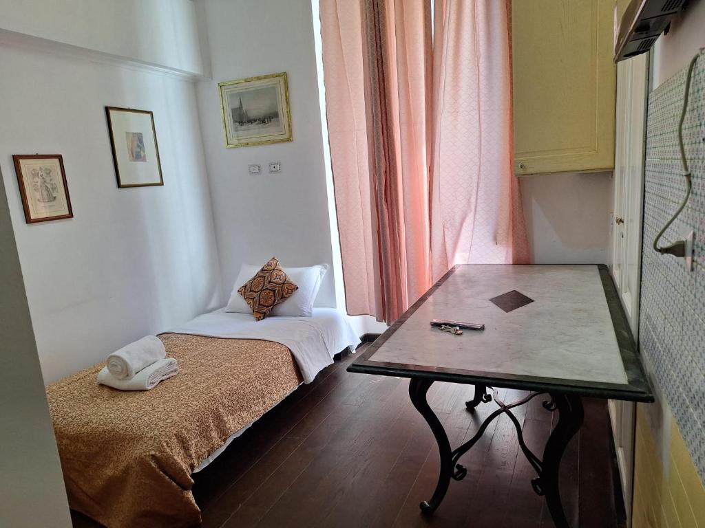 Postel nebo postele na pokoji v ubytování Casa Fanti 57