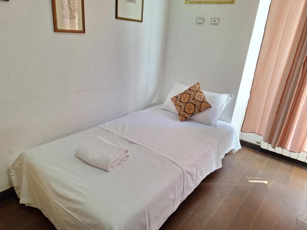 Postel nebo postele na pokoji v ubytování Casa Fanti 57