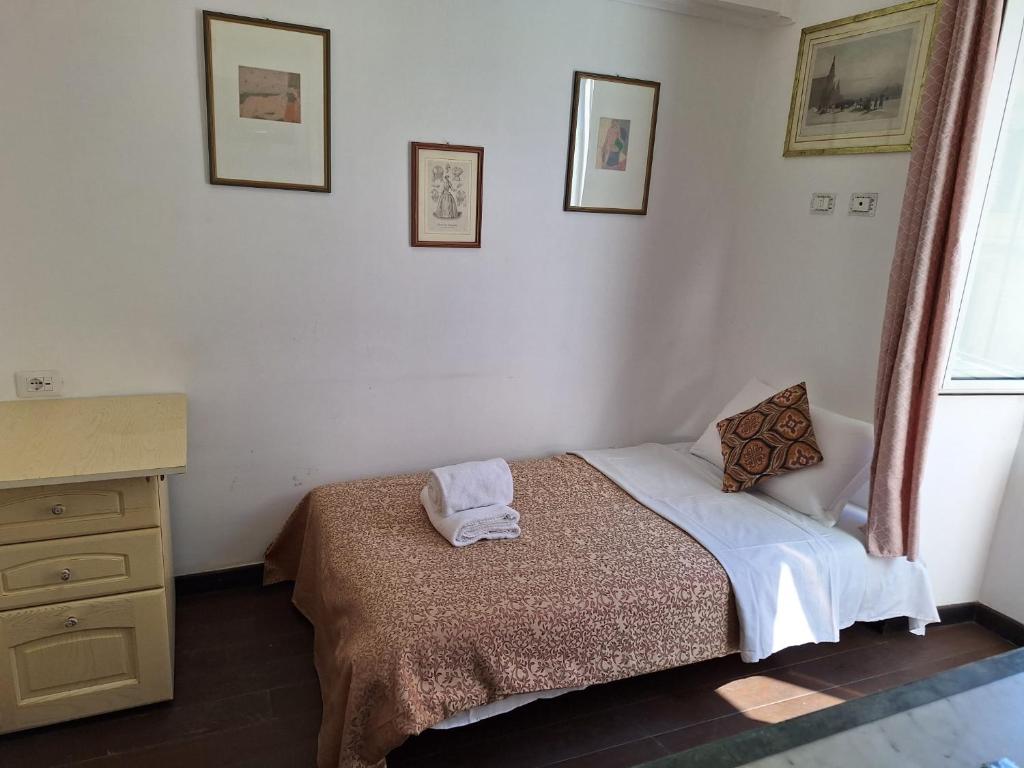 Postel nebo postele na pokoji v ubytování Casa Fanti 57