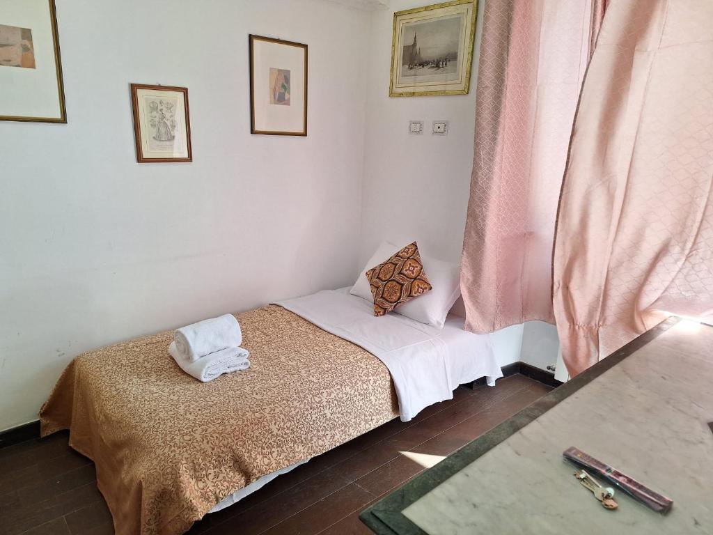 Postel nebo postele na pokoji v ubytování Casa Fanti 57