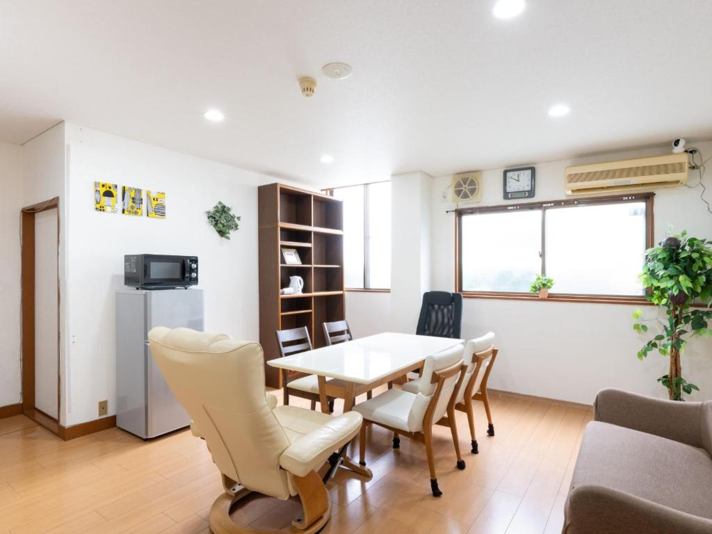 Kuchyň nebo kuchyňský kout v ubytování Travel Inn Kofu