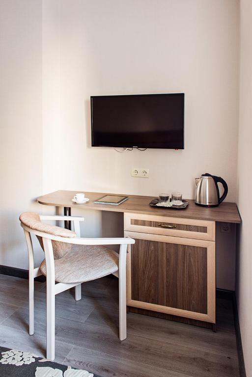 TV a/nebo společenská místnost v ubytování Time Hotel