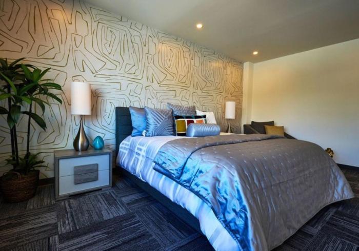 Postel nebo postele na pokoji v ubytování Ola Boutique Hotel