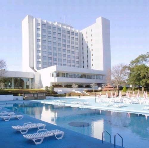 Bazén v ubytování International Resort Hotel Yurakujo nebo v jeho okolí