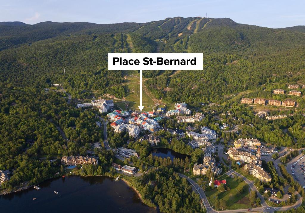 an aerial view of a resort in the mountains at Place Saint Bernard Mont Tremblant in Mont-Tremblant