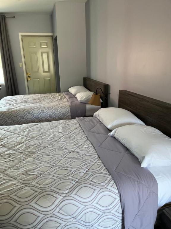 Voodi või voodid majutusasutuse Motel la Siesta de Gascon toas