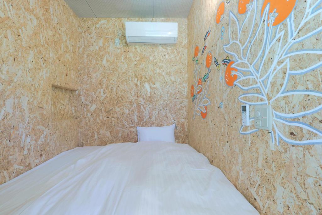 Postel nebo postele na pokoji v ubytování TADONO the bedroom