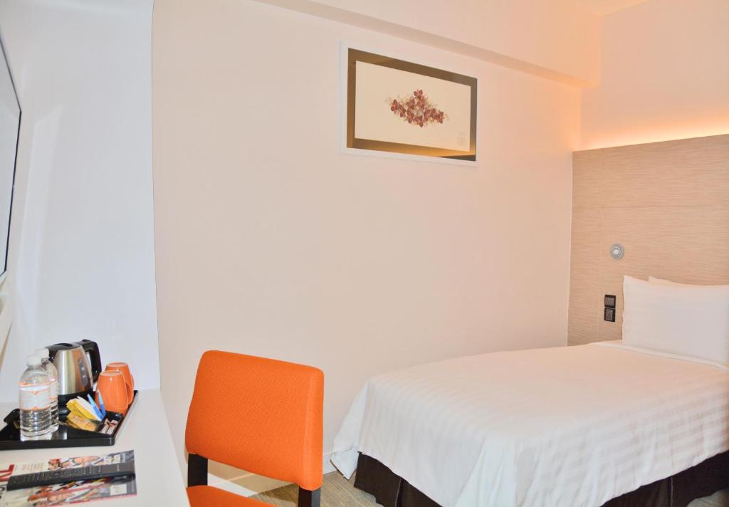Postel nebo postele na pokoji v ubytování Sama-Sama Express KLIA Terminal 2 - Airside Transit Hotel