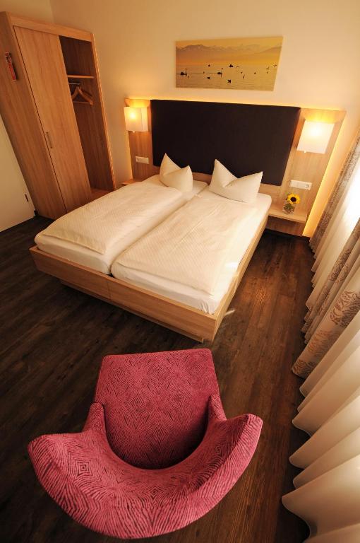 Postel nebo postele na pokoji v ubytování Hotel Ritter