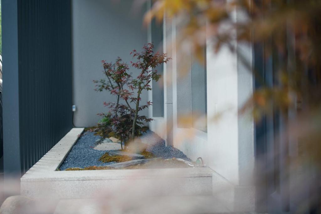 Postel nebo postele na pokoji v ubytování Xi'an Jasmine Boutique Inn