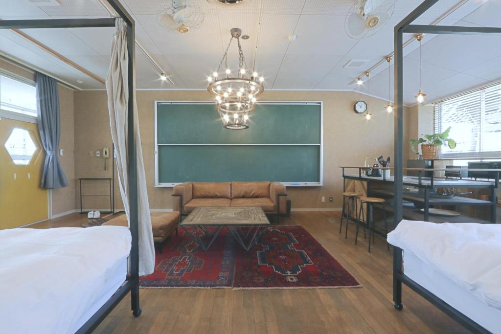 Postel nebo postele na pokoji v ubytování TADONO the bedroom