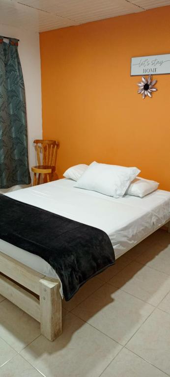 Postel nebo postele na pokoji v ubytování Casa Maral Hostal