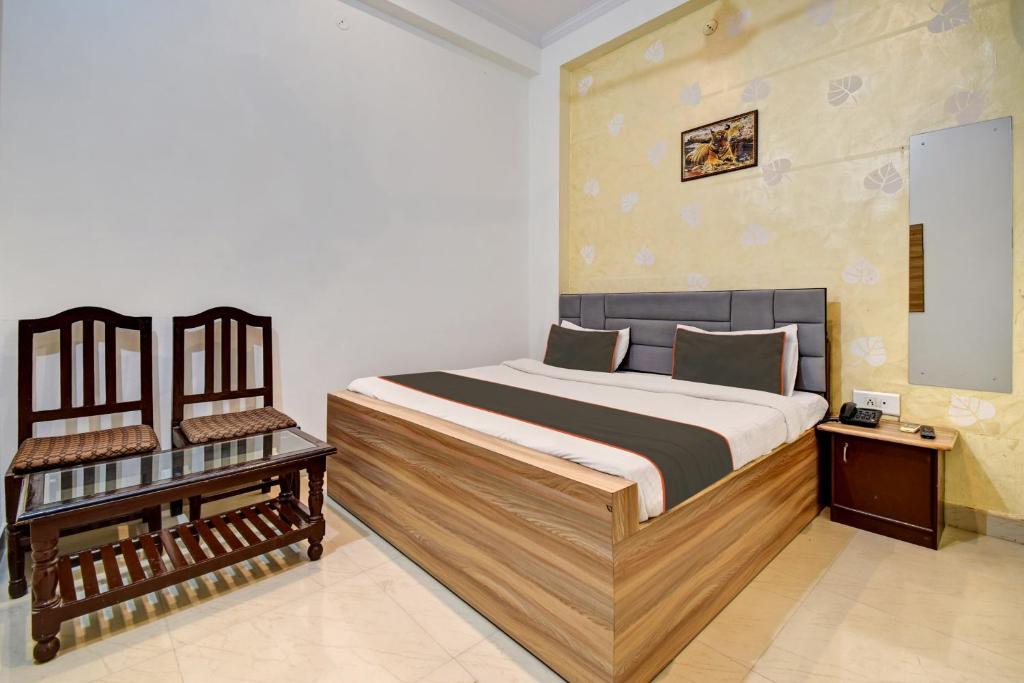מיטה או מיטות בחדר ב-Tiger View Hotel