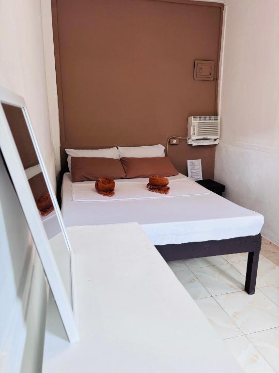 Postel nebo postele na pokoji v ubytování Paradiso Hostel El nido