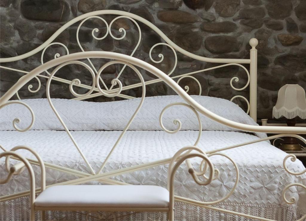 Postel nebo postele na pokoji v ubytování Agriturismo Scribano