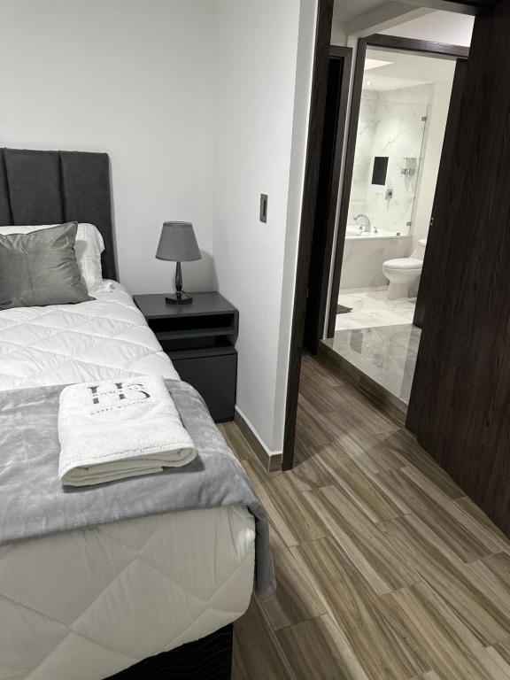Postel nebo postele na pokoji v ubytování home 333 habitacion 337