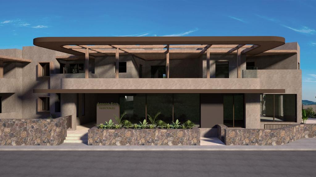 d'une maison avec un bâtiment dans l'établissement Ammos Eco Residence, à Karteros