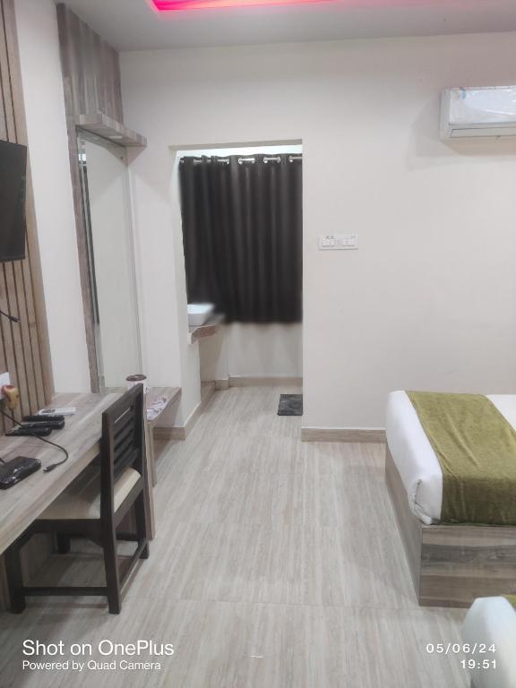 Postel nebo postele na pokoji v ubytování Hotel Praj Paradise