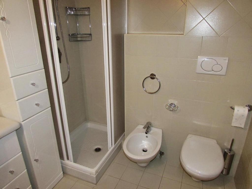 Koupelna v ubytování Apartment Albaré Residence