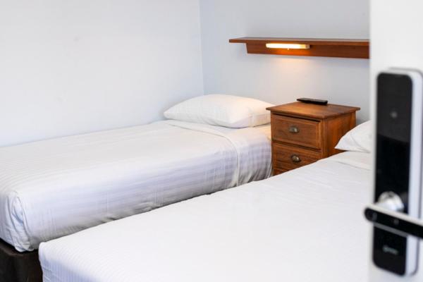 Postel nebo postele na pokoji v ubytování Manjimup Motor Inn