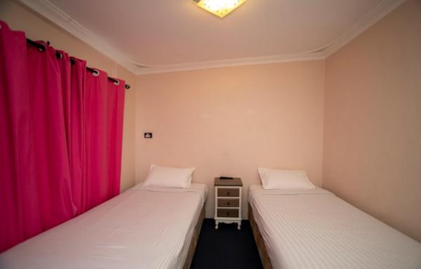 Postel nebo postele na pokoji v ubytování Manjimup Motor Inn