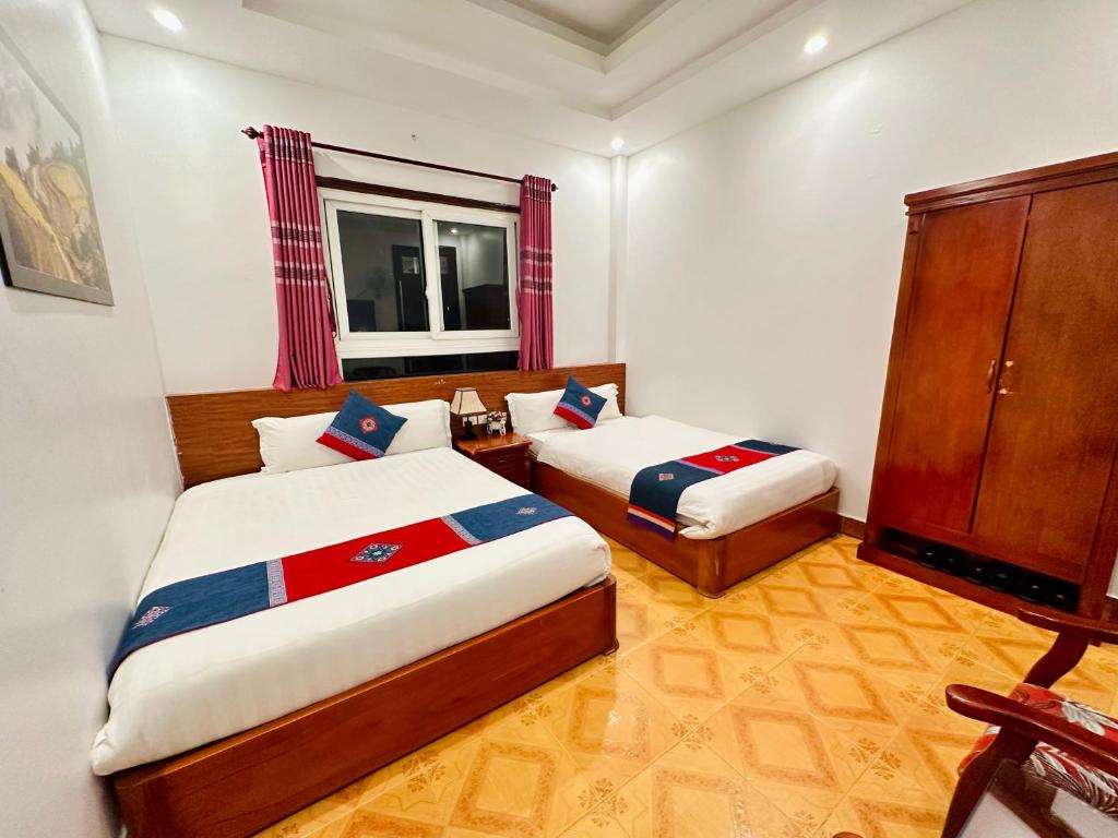 Postel nebo postele na pokoji v ubytování Thanh Quyen hotel