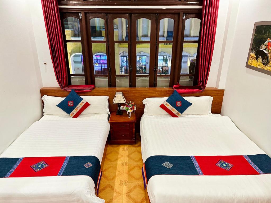 Postel nebo postele na pokoji v ubytování Thanh Quyen hotel