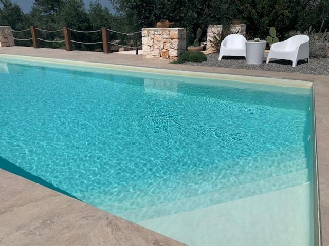 Bazén v ubytování Trulli Santa Maria Odegitria Relais nebo v jeho okolí