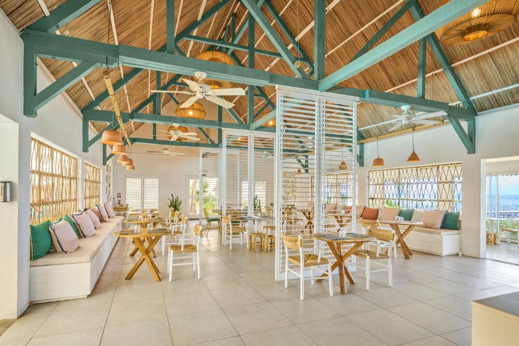 Restaurace v ubytování Tropical Attitude (Adults Only)