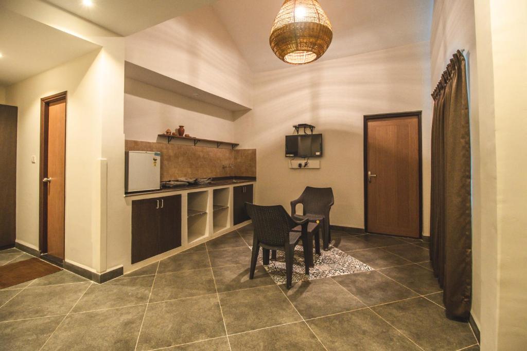 Kuchyň nebo kuchyňský kout v ubytování Amber Rooms
