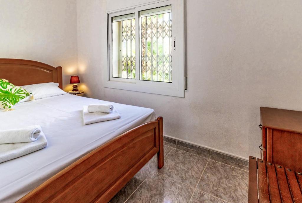 Posteľ alebo postele v izbe v ubytovaní Fener de Dalt 89 Casa con piscina y vistas