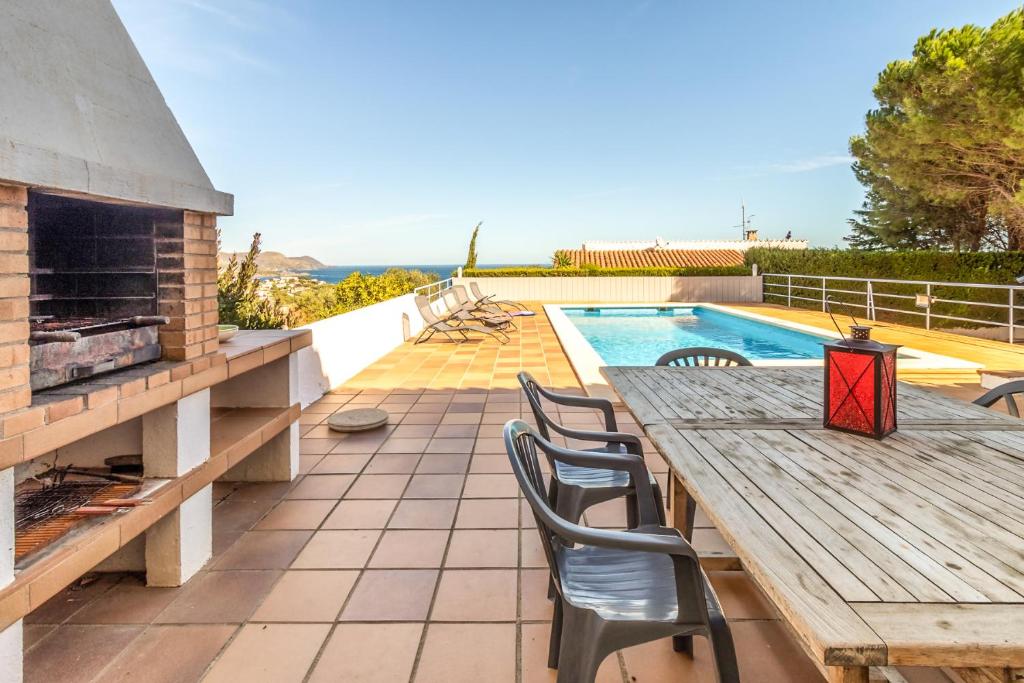 Bazén v ubytovaní Fener de Dalt 89 Casa con piscina y vistas alebo v jeho blízkosti