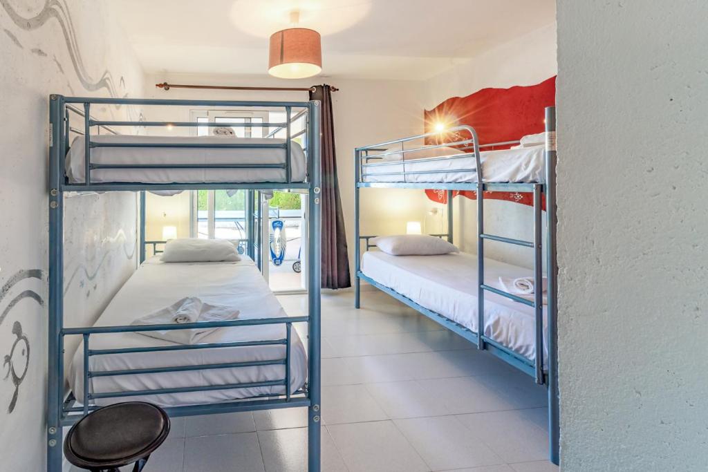 Posteľ alebo postele v izbe v ubytovaní Fener de Dalt 89 Casa con piscina y vistas