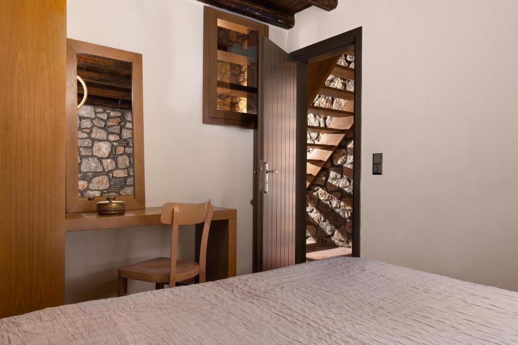 Postel nebo postele na pokoji v ubytování Stone Luxury Suites - Adults Only