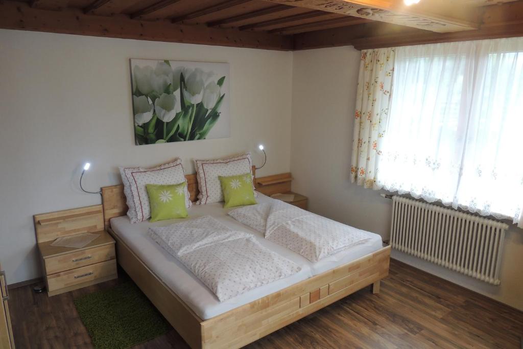 Postel nebo postele na pokoji v ubytování Appartement Seggl