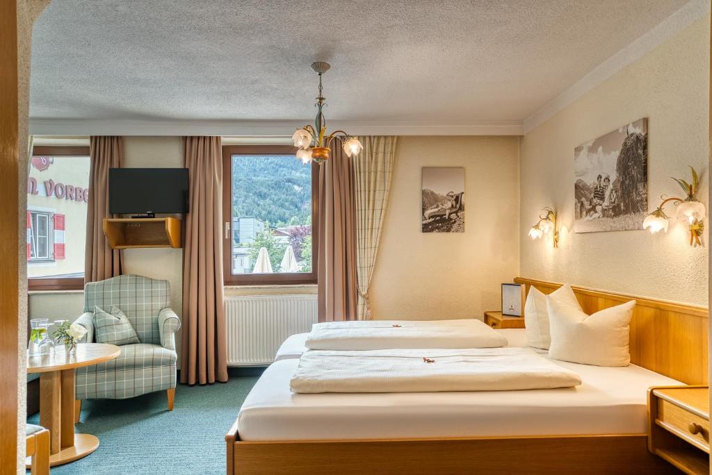 Voodi või voodid majutusasutuse Hotel zum Lamm toas