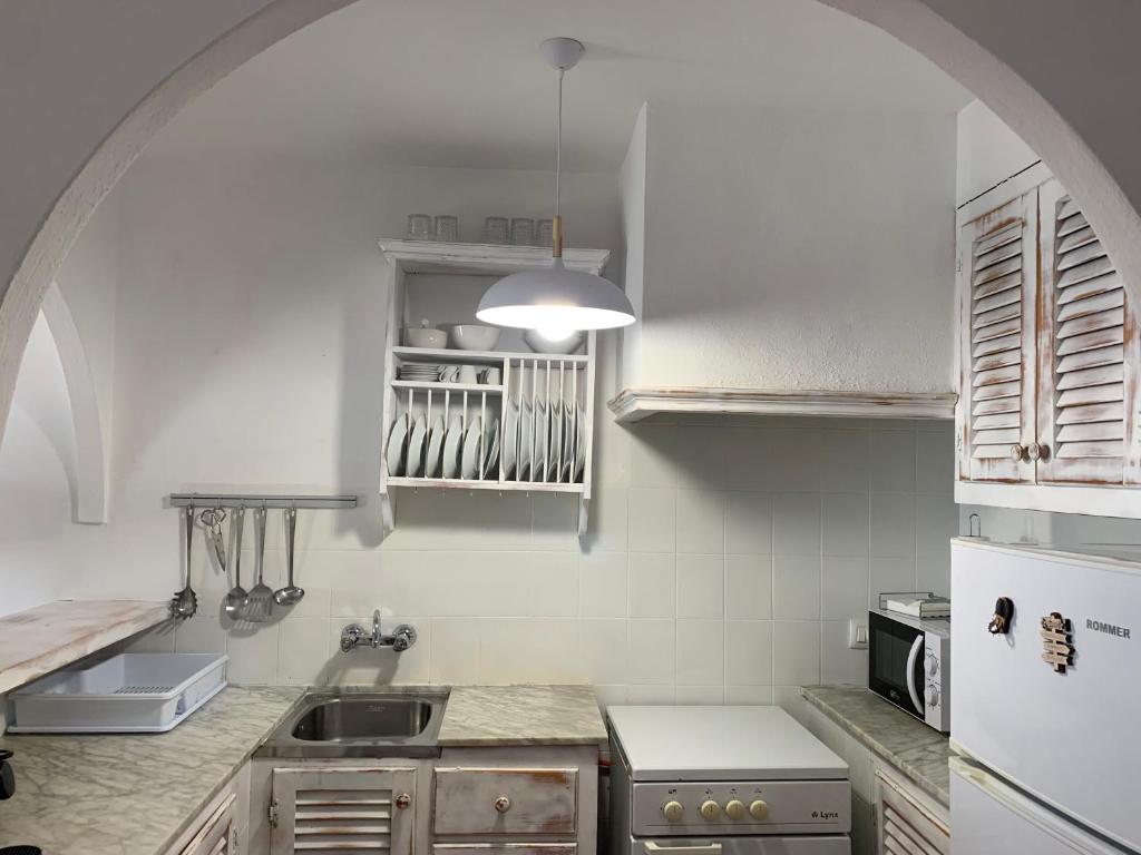 Kuchyň nebo kuchyňský kout v ubytování Apartamento planta baja en Arenal a 3 min playa