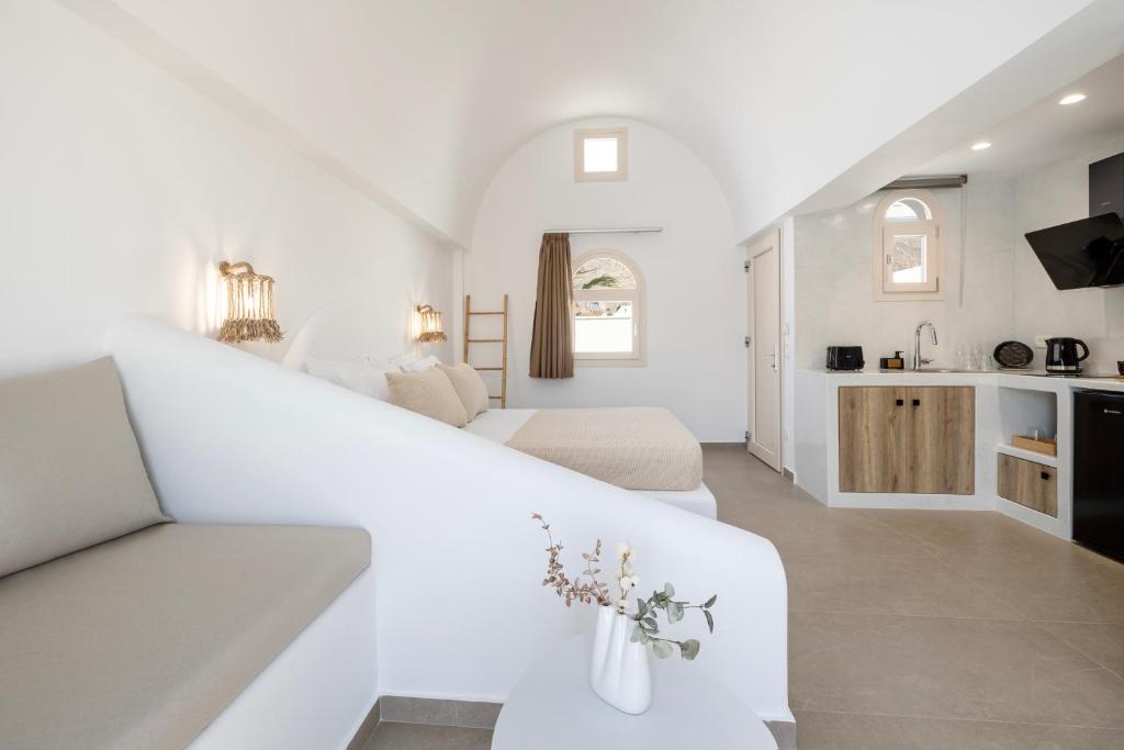 Kuchyň nebo kuchyňský kout v ubytování Commercio Suites Santorini