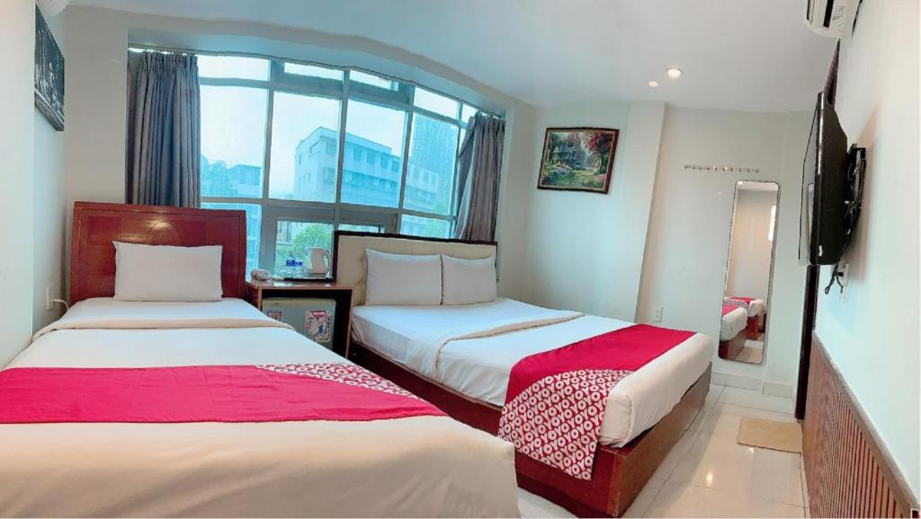 Nu Hotel - 18 Bui Vien Walkstreet - 市景三人间