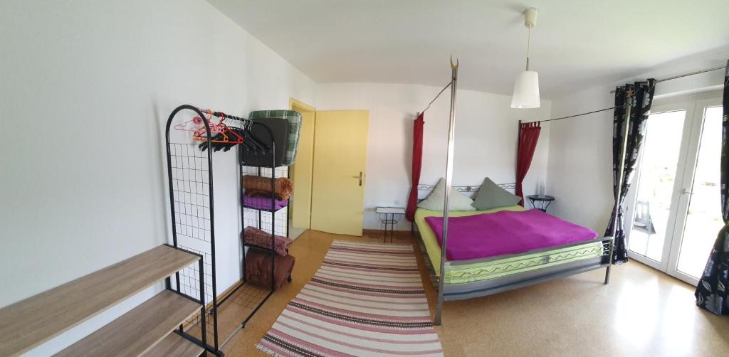 Postel nebo postele na pokoji v ubytování Ferienwohnung Alpen Sunshine Füssen
