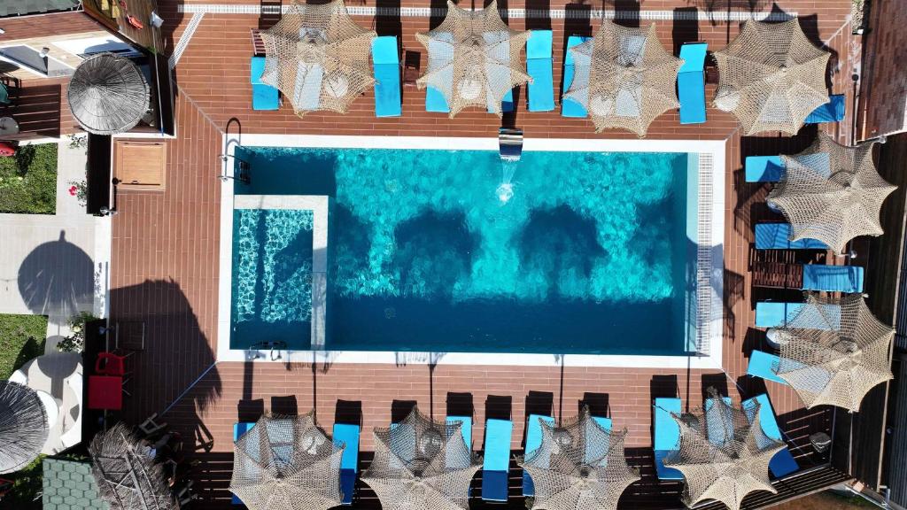 an overhead view of a swimming pool with stars at Vila Shpetimi in Ksamil
