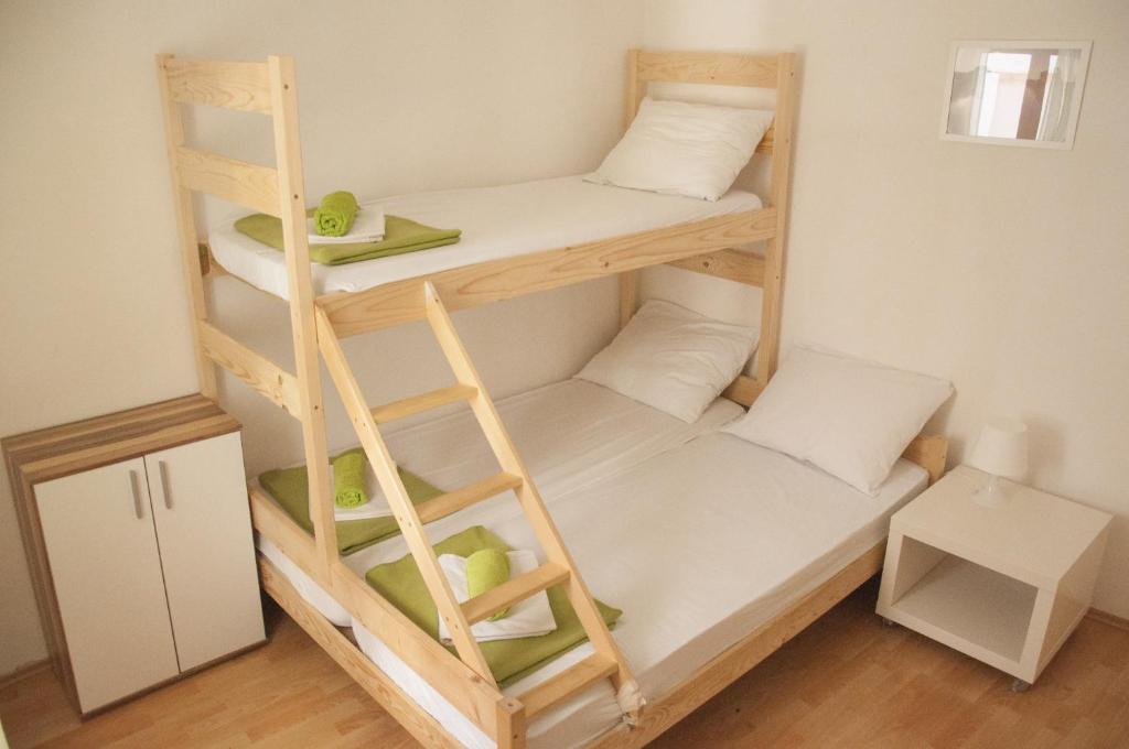 Postel nebo postele na pokoji v ubytování Hostel Piran