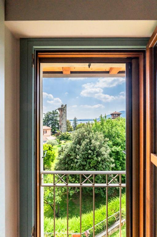 Balkón nebo terasa v ubytování Riflessi sul lago
