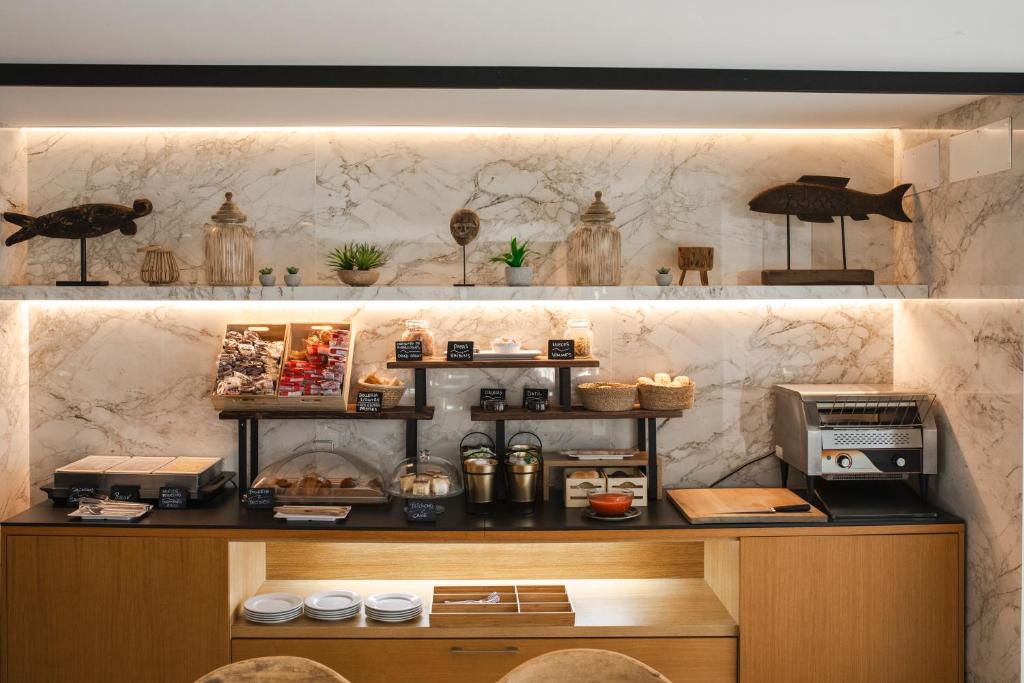 Kuchyň nebo kuchyňský kout v ubytování Hotel-Restaurante Jardines La Tejera